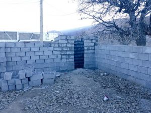 x ساخت حیاط و دیوارکشی مدرسه ابتدایی روستای رستم آباد قلعه رئیسی